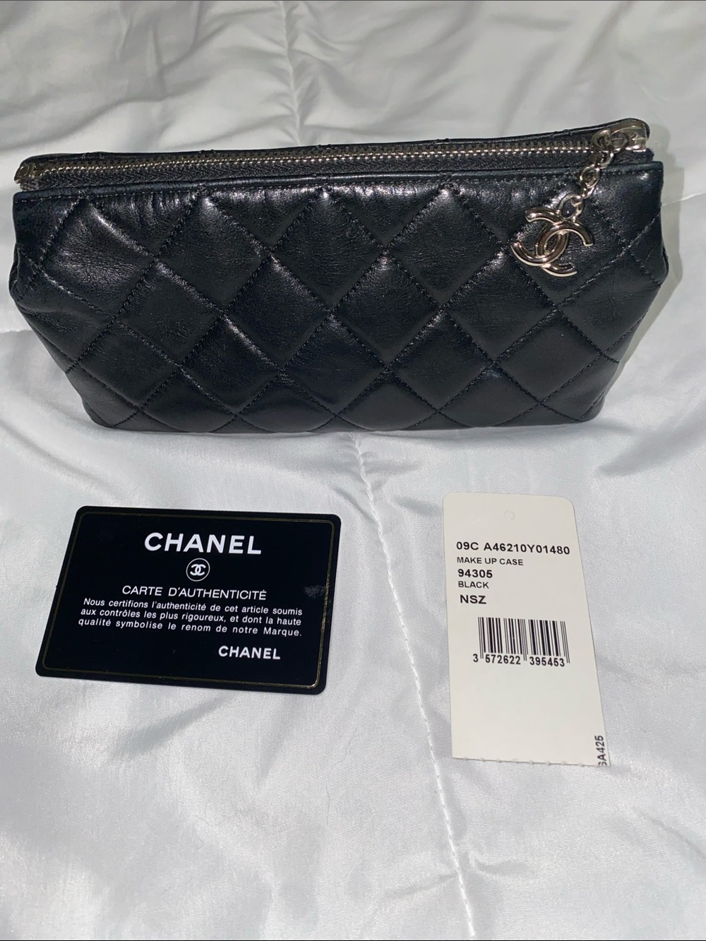 CHANEL Black Quilted Leather Cosmetic Pouch with CC Charm
